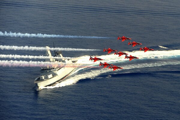 Red arrows hover over the ocean