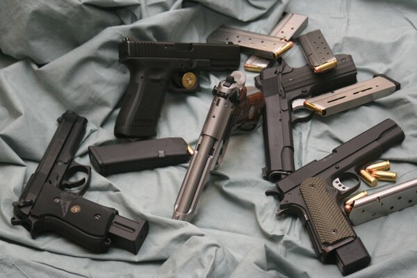 Pistols and clips on a piece of cloth