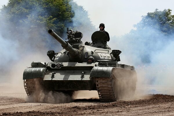 A man in a traveling medium tank