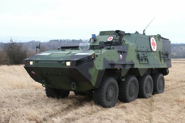 There is an armored sanitary evacuation vehicle in the field