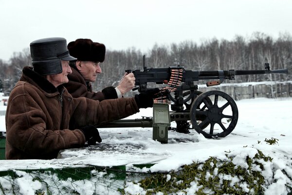 Two veterans shoot at the firing range