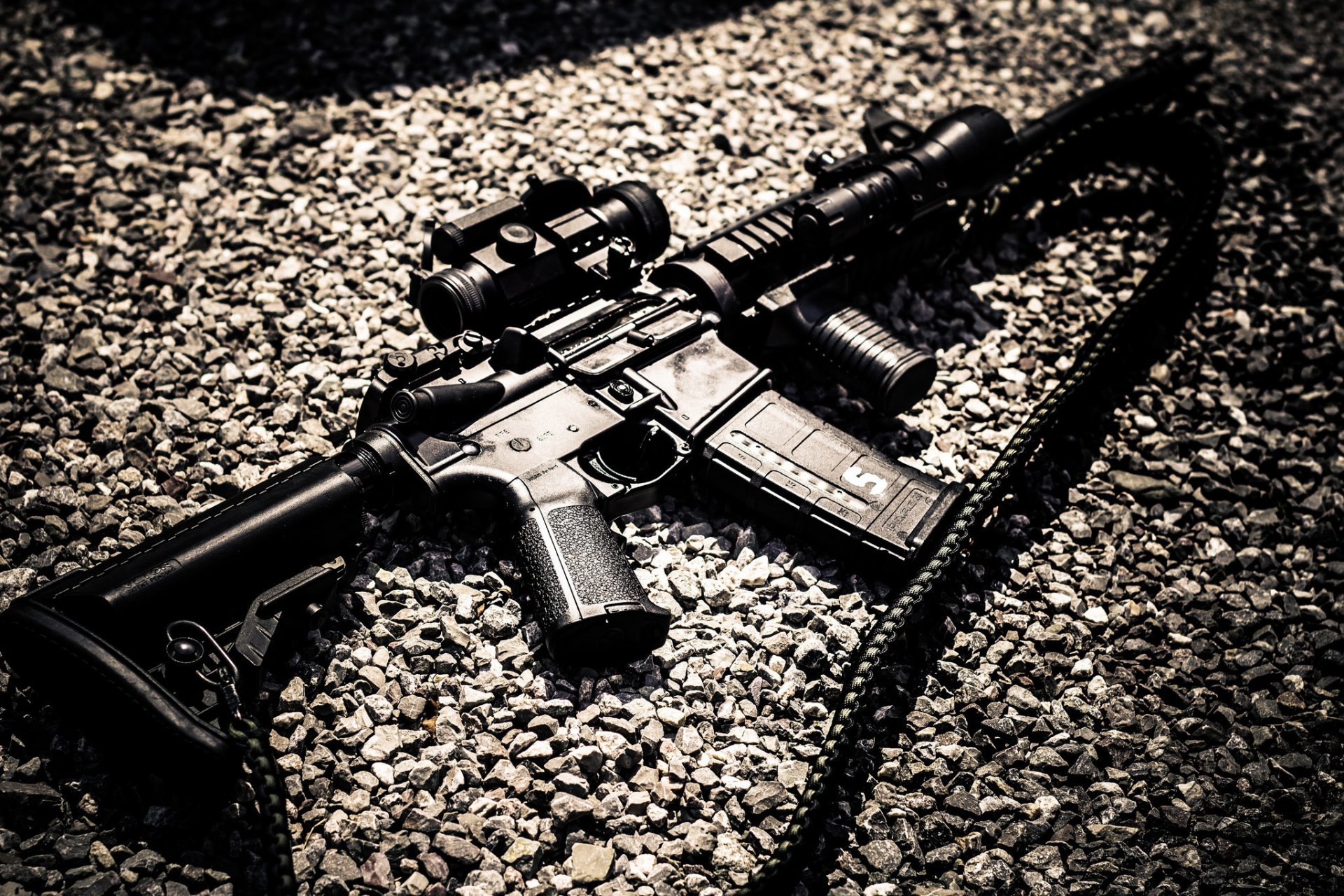 ar-15 assault rifle weapon gravel