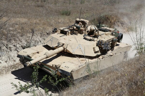 Photo of a tank with two tankmen