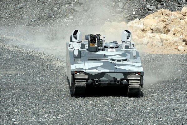 CV90 armored combat vehicle, rides on gravel