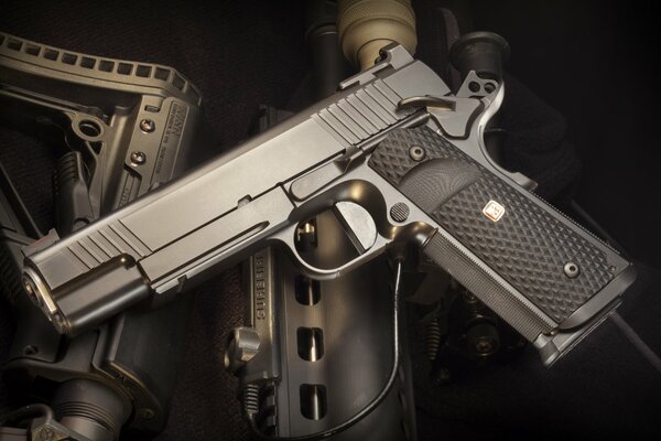 Semi-automatic pistol on a dark background