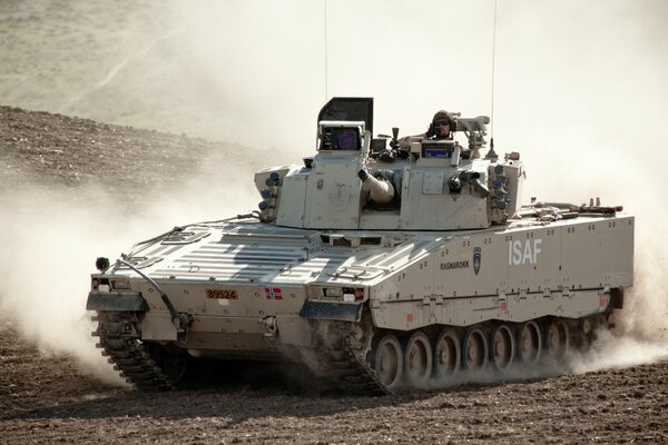 Swedish combat vehicle in the dust