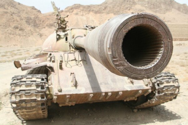 A huge barrel of a sand tank