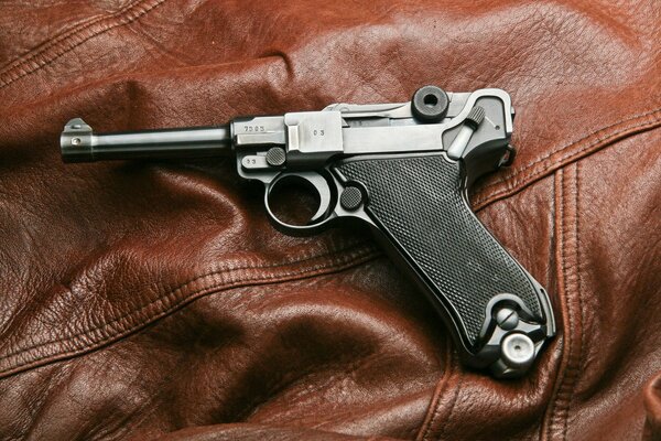 P08 pistol on a leather jacket