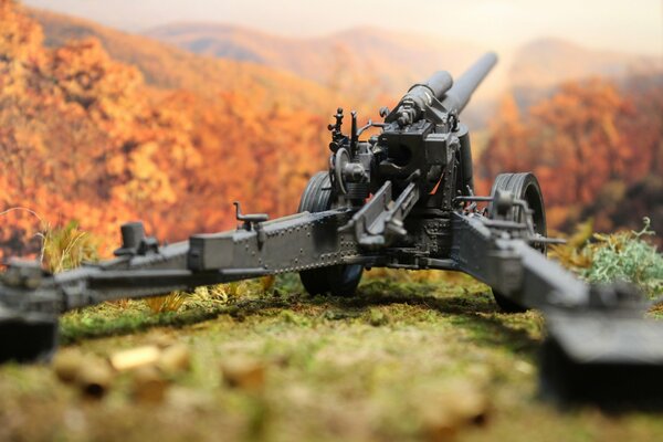 German heavy machinery stands against the background of an autumn forest