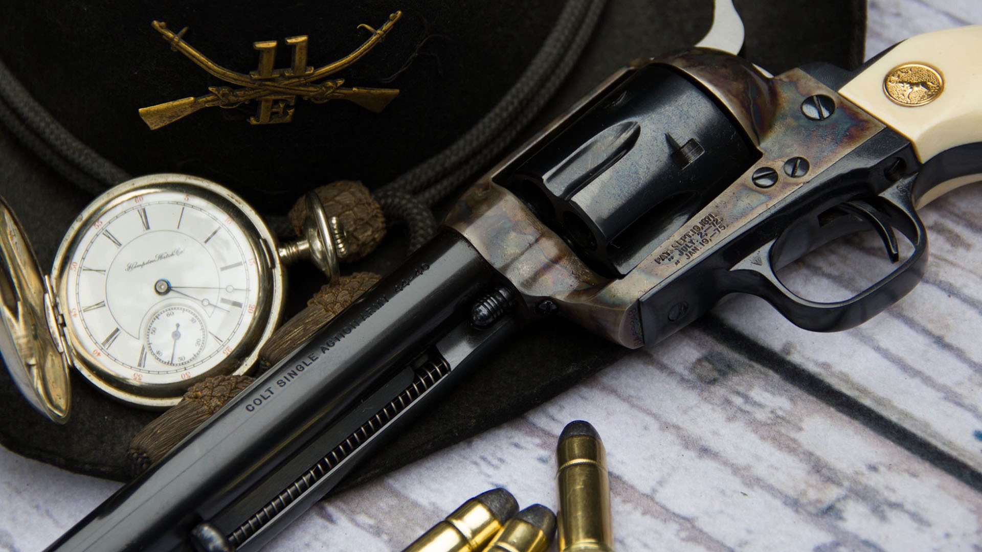 colt action army revolver trunk weapon cartridges watches hat