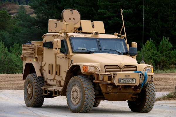 Armored fighting vehicle on the background of the road