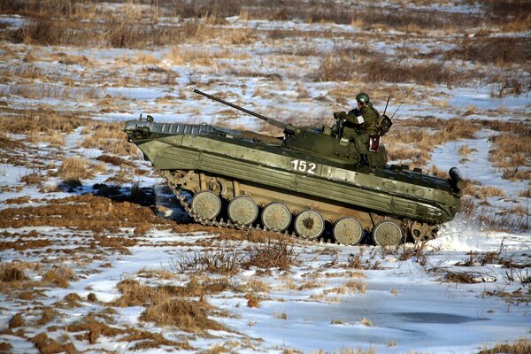 Combat vehicle in action in winter