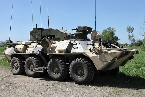 A combat vehicle on the side of the main road 