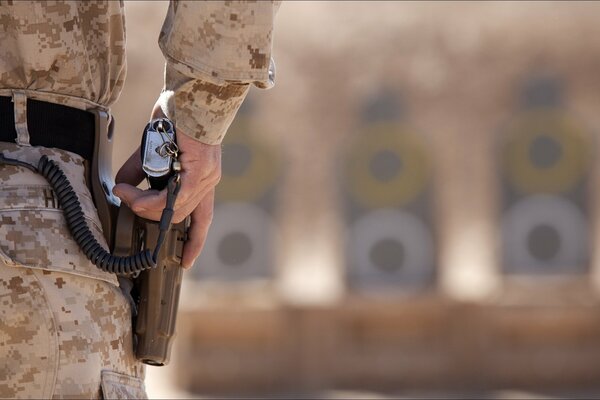 Soldiers prepare to shoot at targets