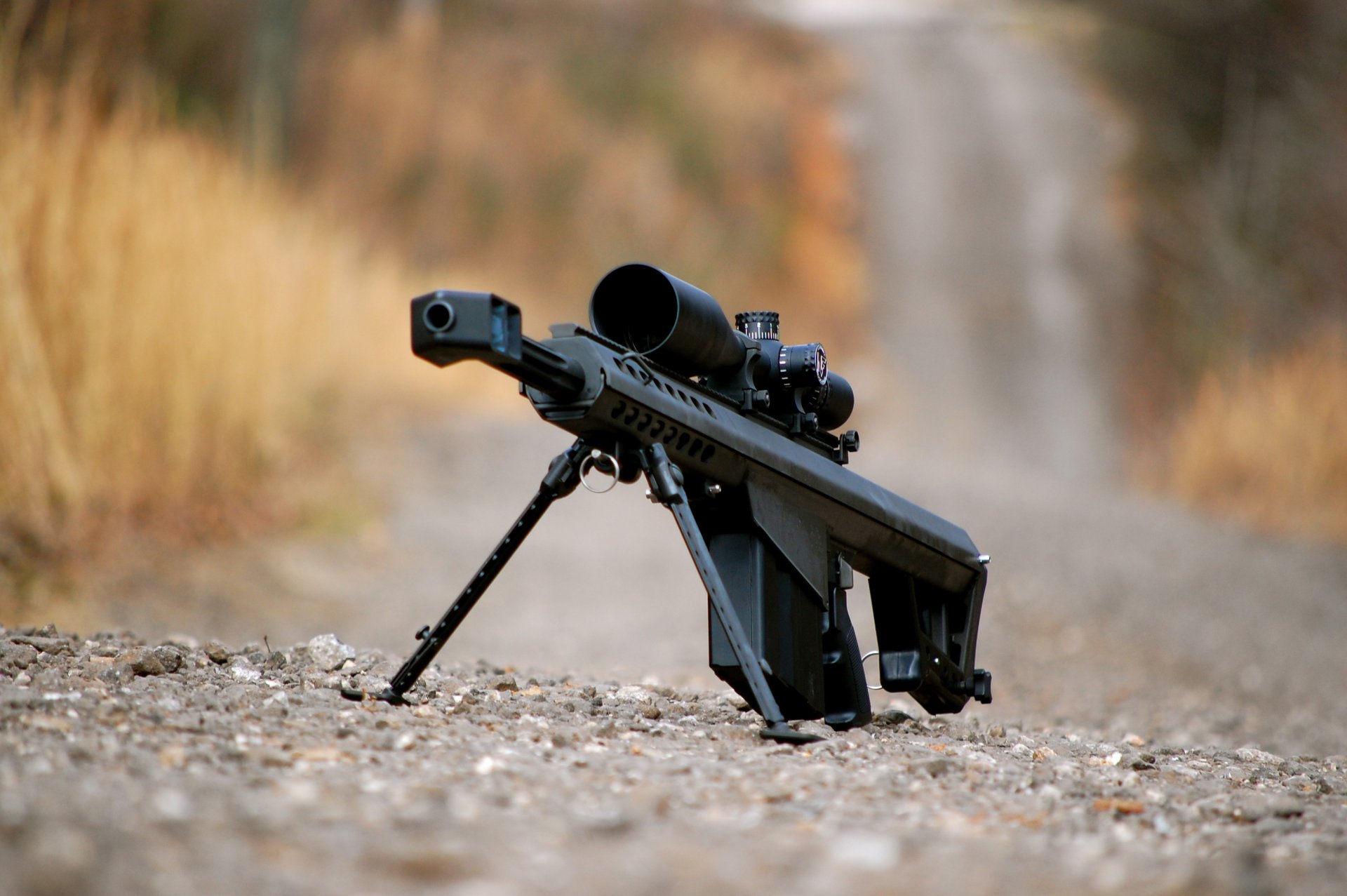 barrett m82 large-caliber sniper rifle gravel