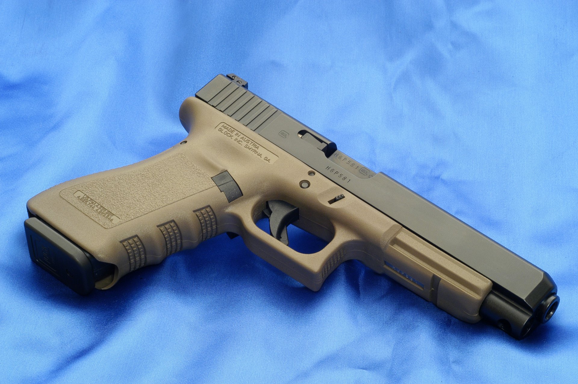 glock 34od arma fondo de pantalla austria 34od pistola cañón fondo azul