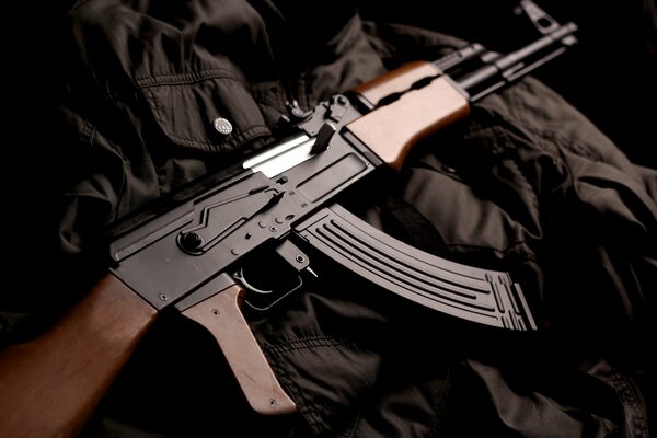 Kalashnikov assault rifle on a black jacket