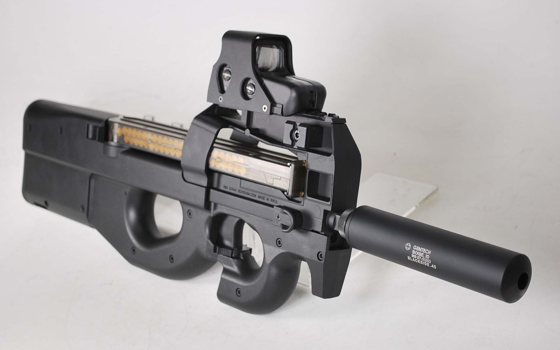 fn p90 belgian submachine gun personal self-defense weapon developed in 1986-1987. was first of all developed for tankers and drivers combat cars has boxed magazine on cartridges the bullet of this cartridge is capable of piercing tita