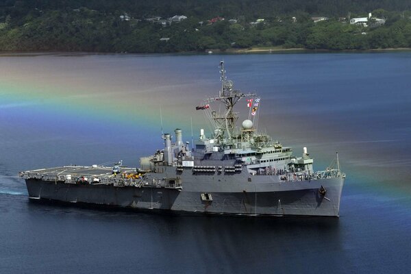 A warship sails on the sea