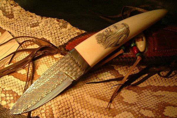 Handmade knife with a bone handle