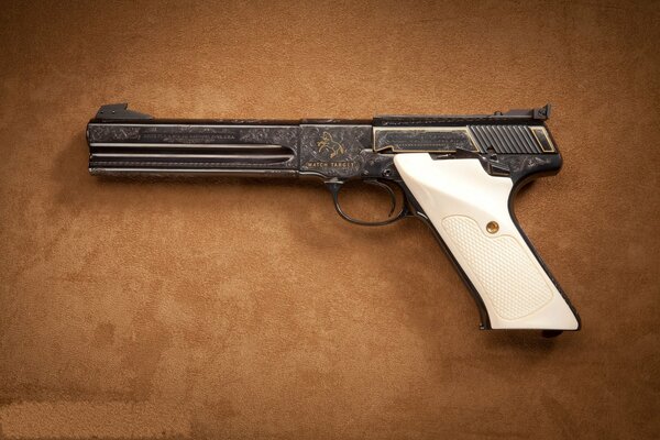 A beautiful pistol with a white handle