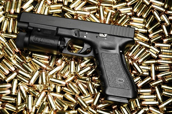 Foto pistola Glock 35 en el fondo del cartucho