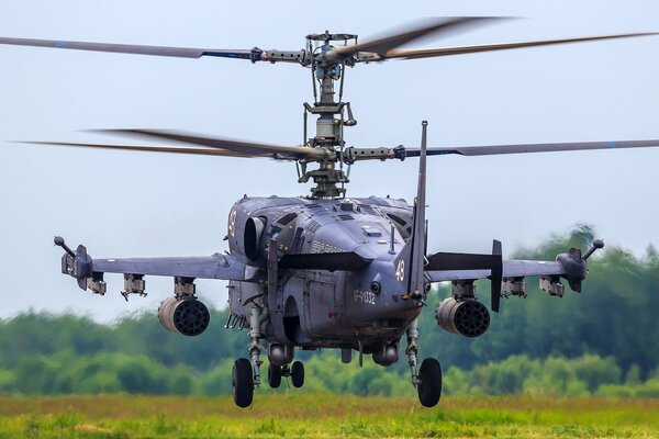 Russian KA-52 military helicopter on take-off