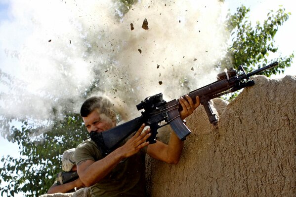 Dodges shrapnel from soldiers in the trench