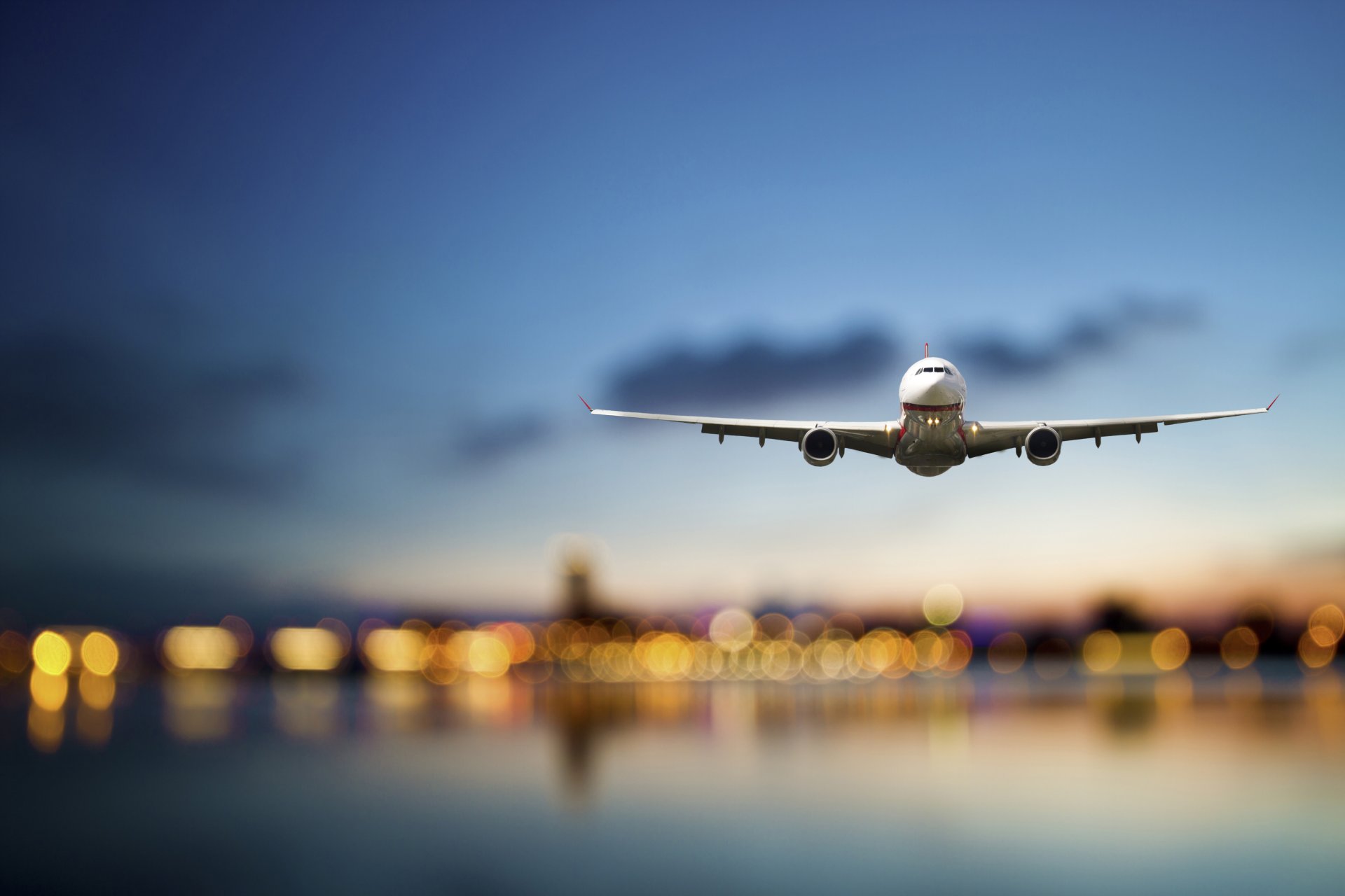 airplane passenger airliner altitude sky flight sea lights airport city evening beautiful background blur bokeh wallpaper