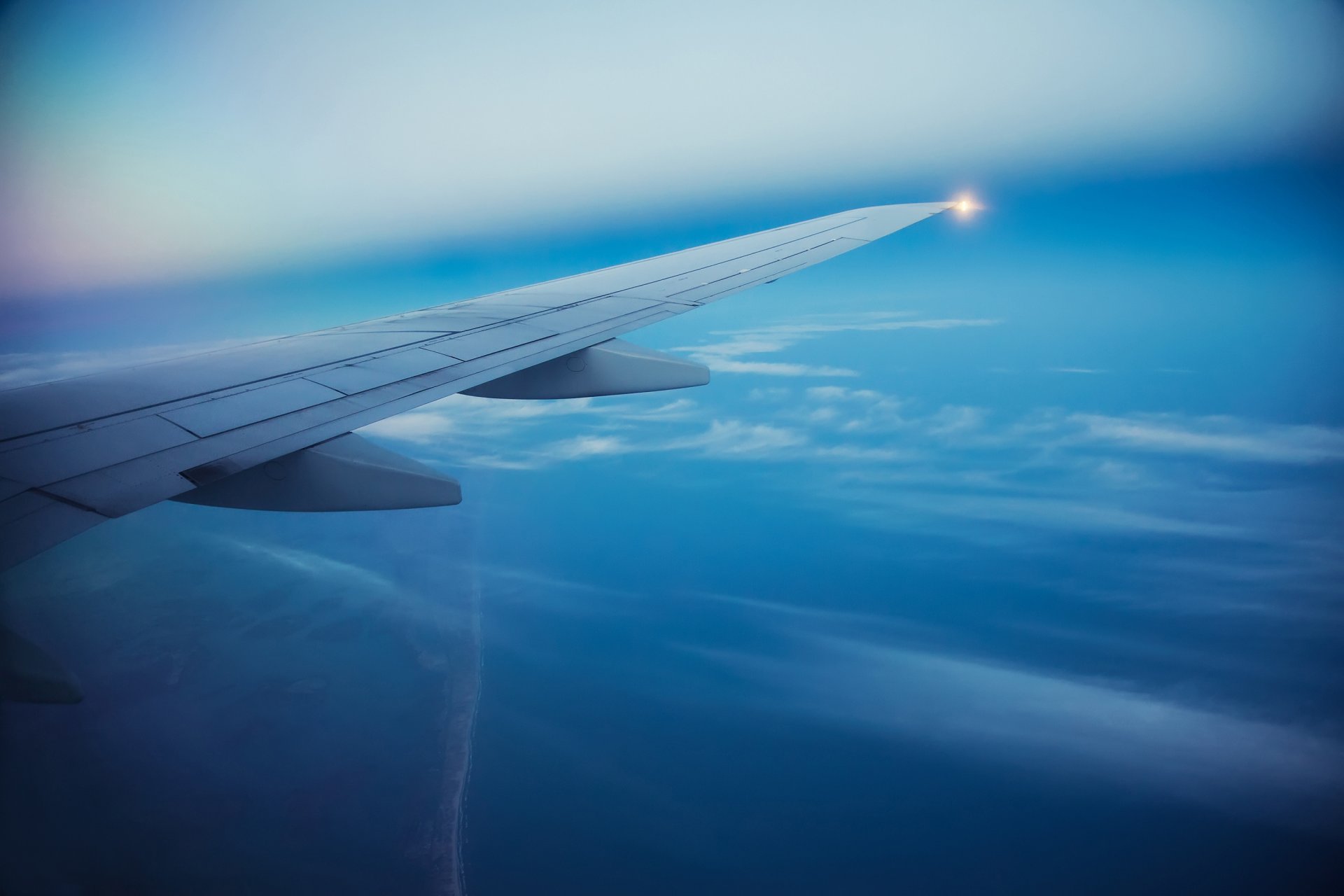 airplane airliner passenger sky clouds flight wing airplane sea islands beautiful background blur bokeh wallpaper