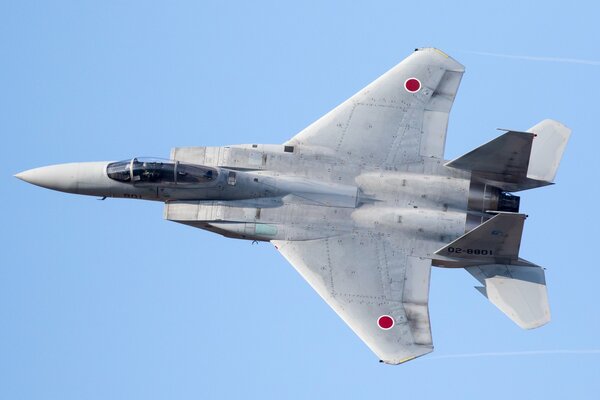 A military plane cuts through the air