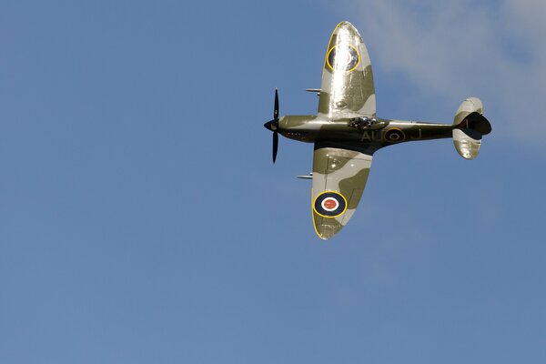 A spitfire fighter in flight. Sky