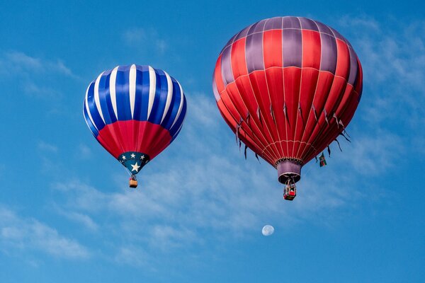 Blue and red balloons in the sky