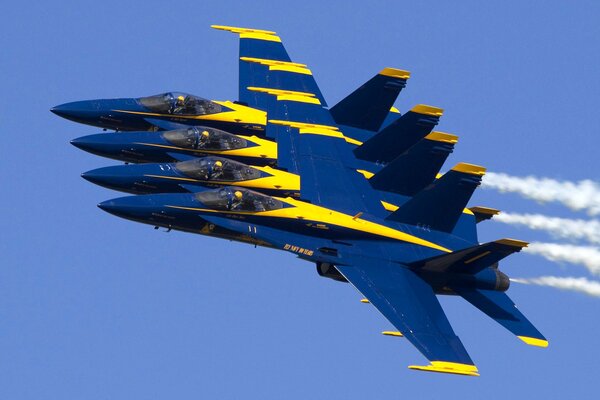 Flight and parade of fighters in the sky in a row