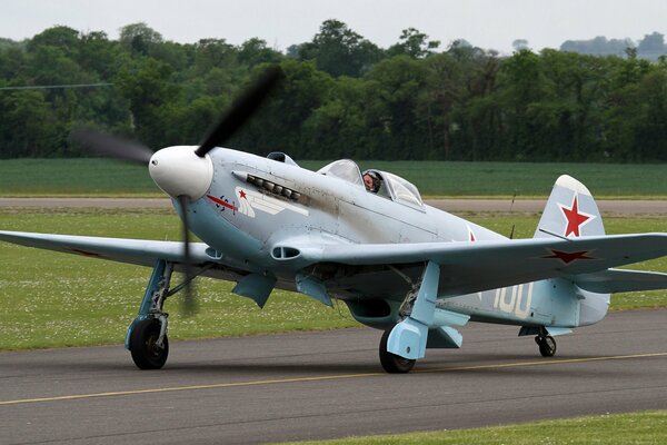 Yak-3m fighter runway takes off