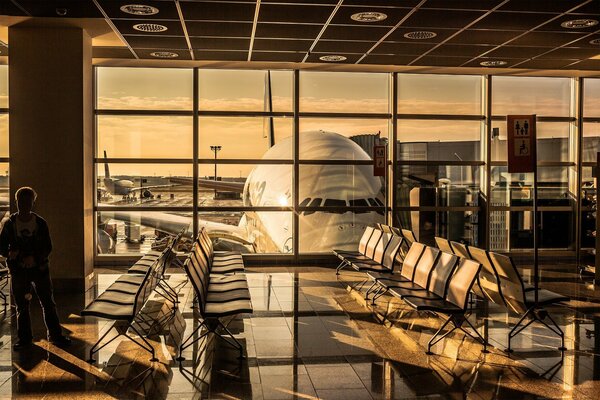 Spectacular sunset at the airport in the waiting room