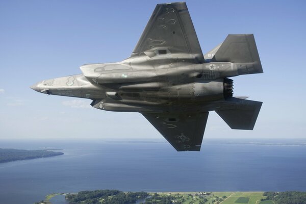 F-35b aircraft hovering over the sea surface