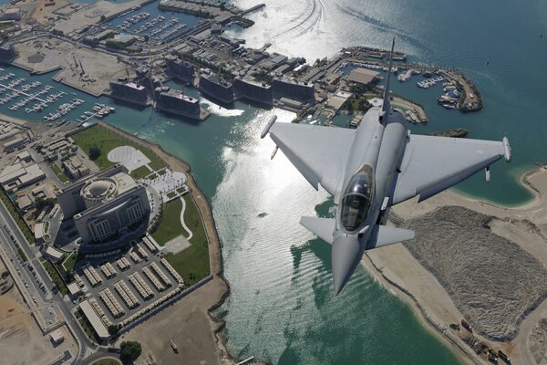 Coastal flyby of a beautiful city