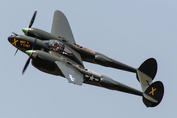 A two-hull bomber is flying on a mission