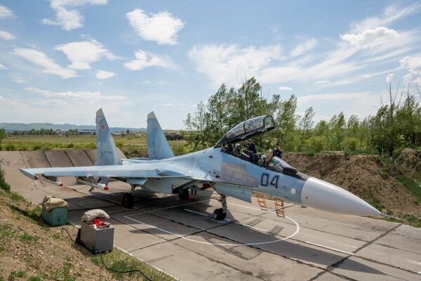 The Su-30 aircraft is on the runway