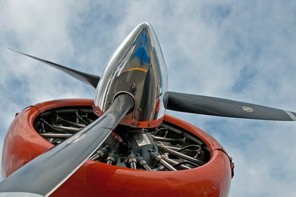 Steel propeller of an airplane against the sky