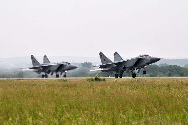 Take-off of a fighter at a military airfield