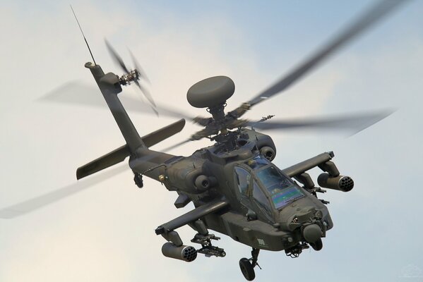 Apache attack helicopter performs a maneuver