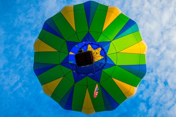 Balloon in the sky clouds