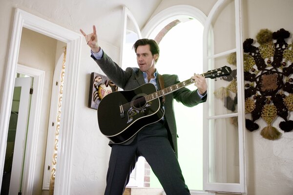 Jim Carrey con la guitarra siempre dice que sí