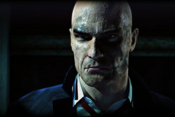 Agent 47 with a serious look from the game hitman absolution