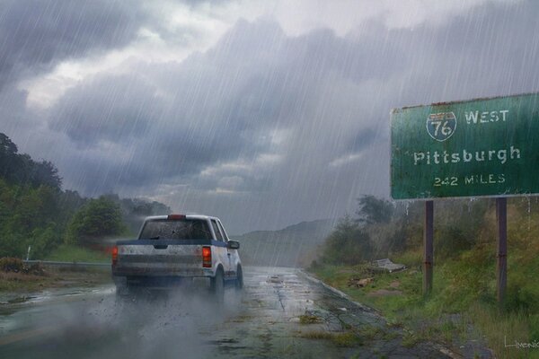 Coche en la carretera bajo el cielo tormentoso