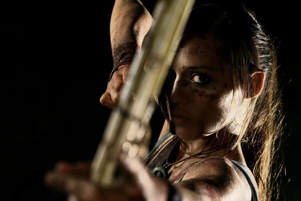 Charming Lara Croft in the archery scene