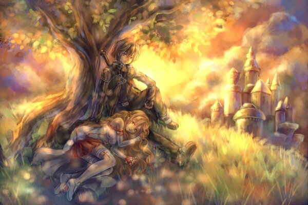 A guy with a girl on a hill under a tree