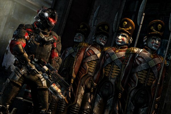 Jeu Dead space 3. Un soldat en armure se tient à côté d un soldat d étain